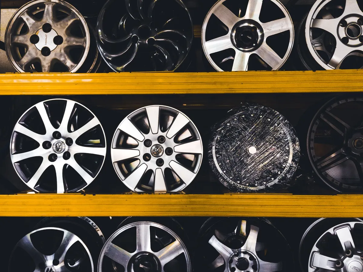 Rack of alloy wheels available at The Tyre Warehouse Wellington